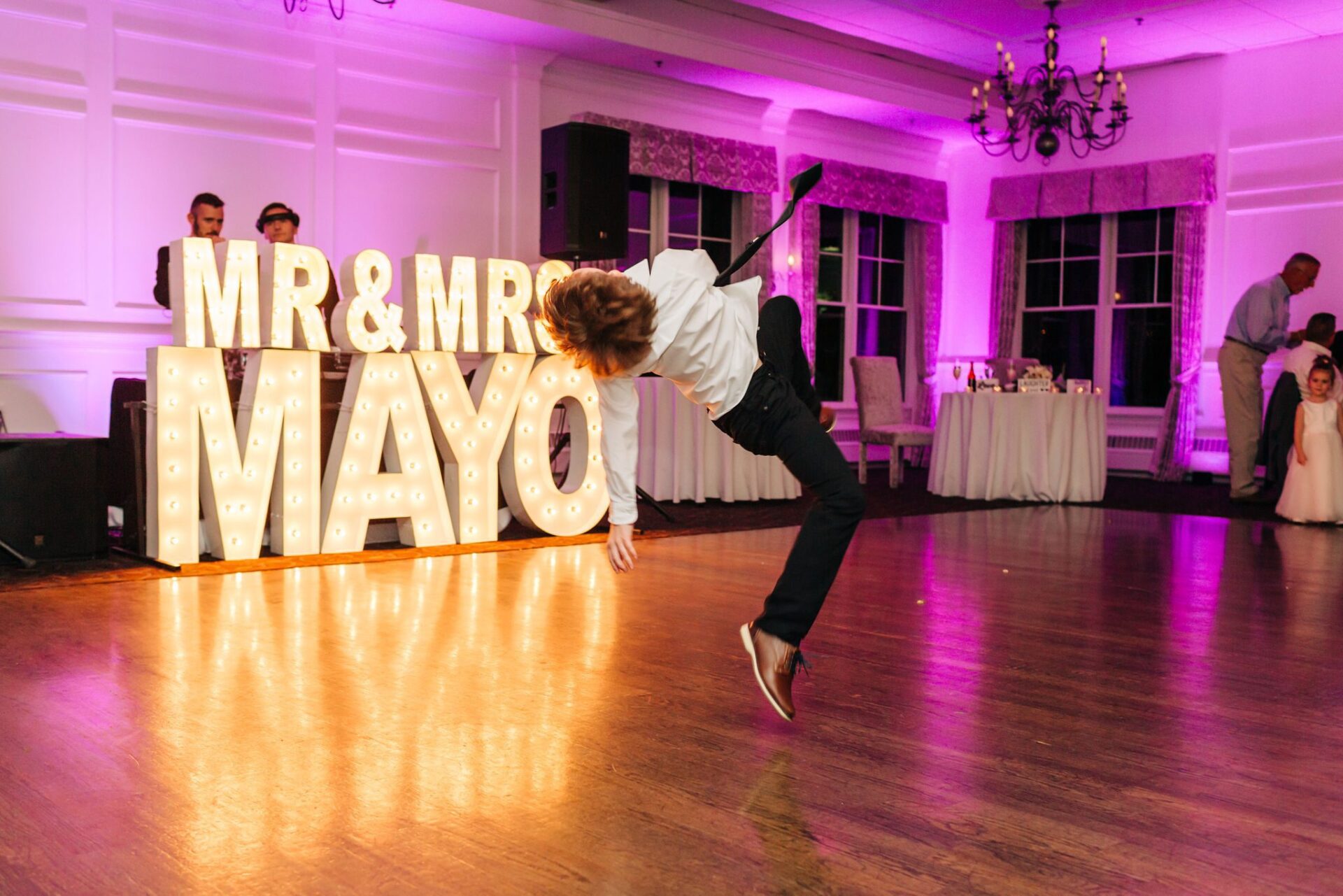Illuminated marquee letters with pink event uplighting at Black Swan venue