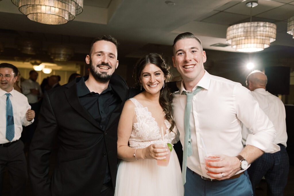 wedding dj with bride and groom