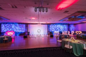 Professional theatrical stage lighting design for a large wedding ballroom reception in the Boston area