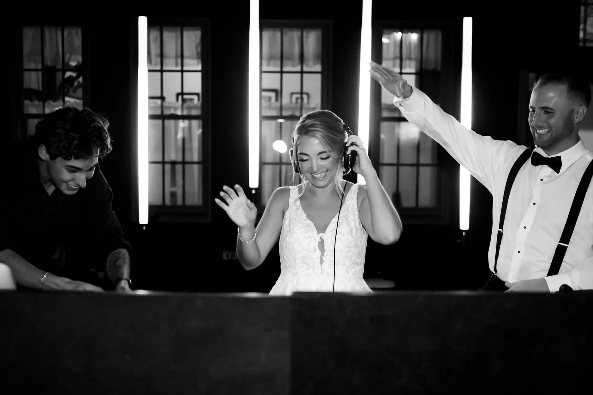 Couple on the dance floor surrounded by full-spectrum LED pixel tube light show at a Boston wedding