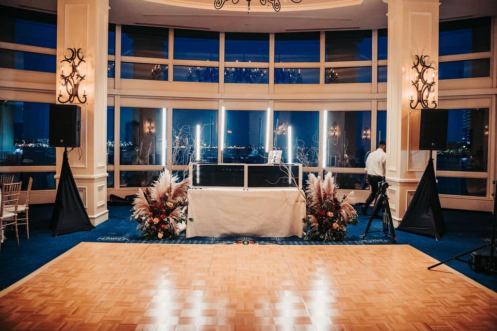 Black Diamond Event Production light-up pixel tube DJ booth at a wedding reception in Boston