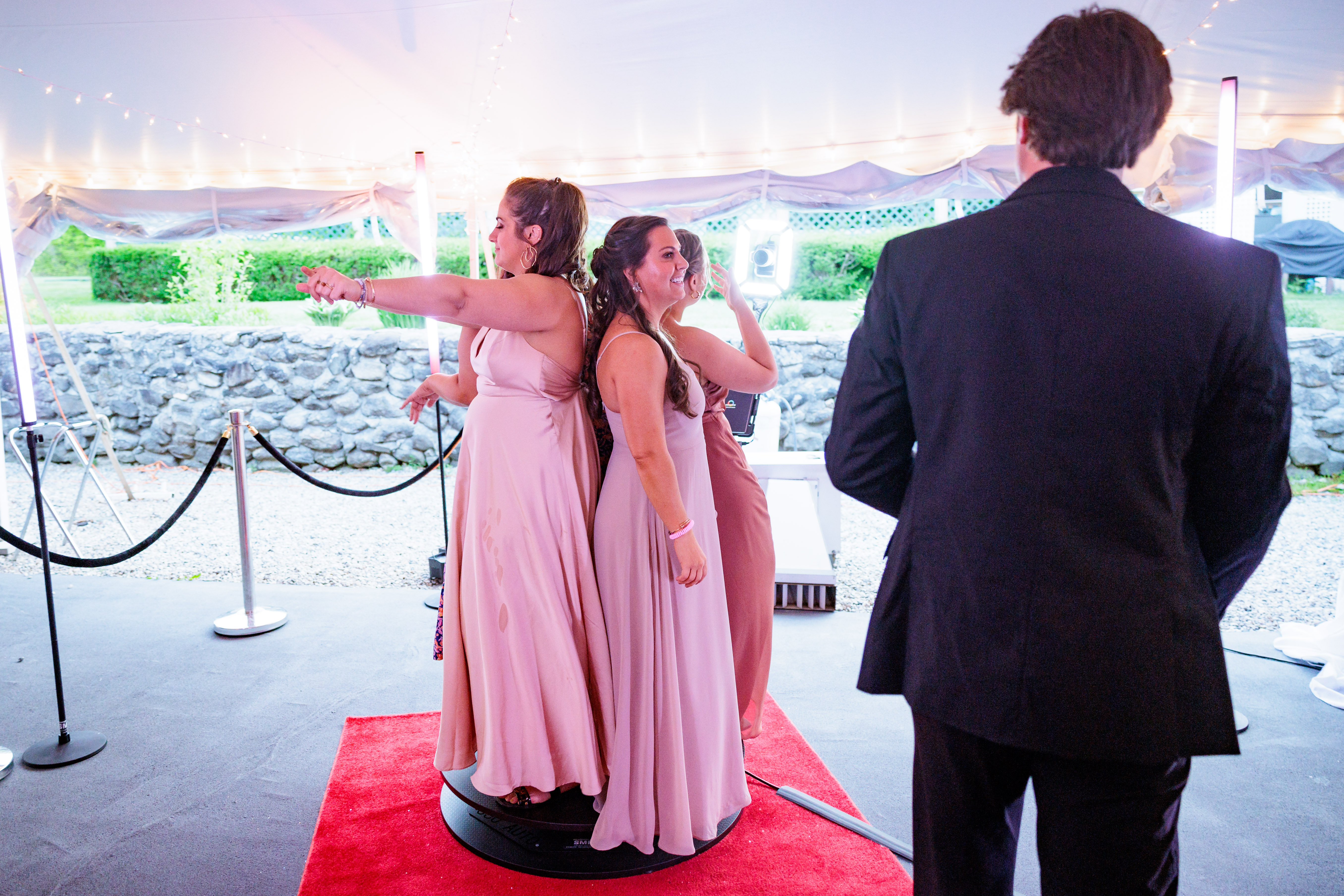 Guests gathered at the Black Diamond photo booth at the Doyle Wedding reception in New England