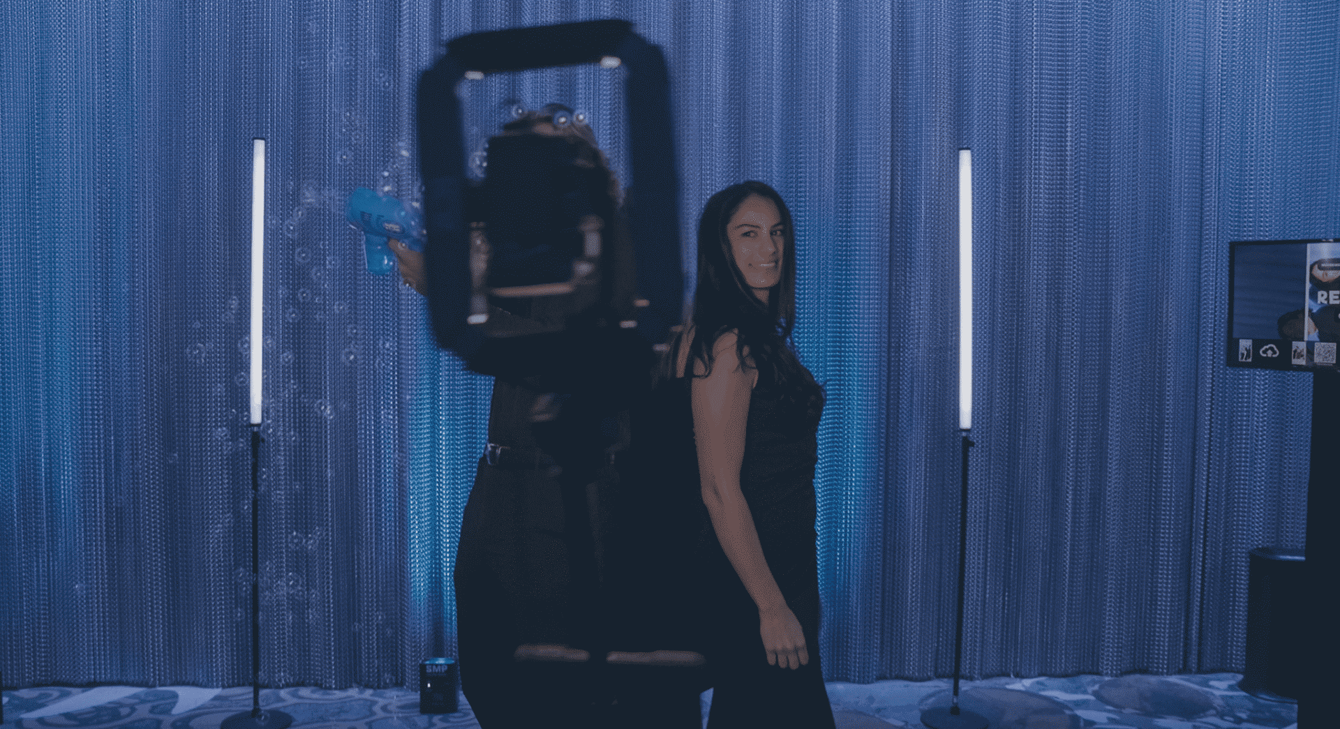 360 photo booth platform detail with LED lighting and red carpet setup