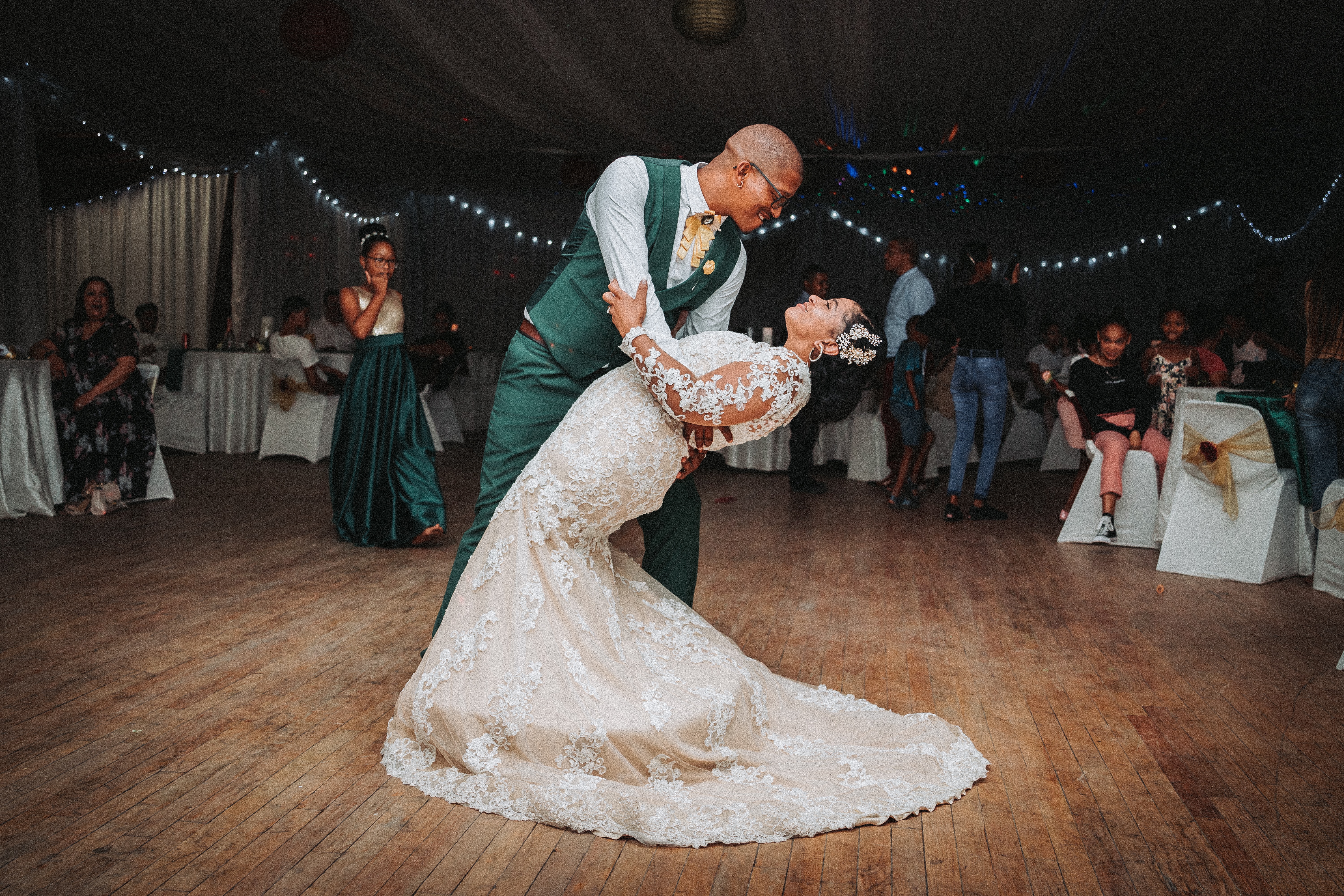 bride and groom first dance dip
