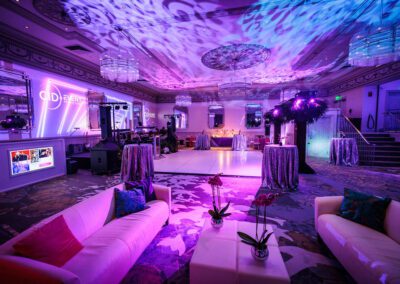 Moving head lights at a glow-theme party event