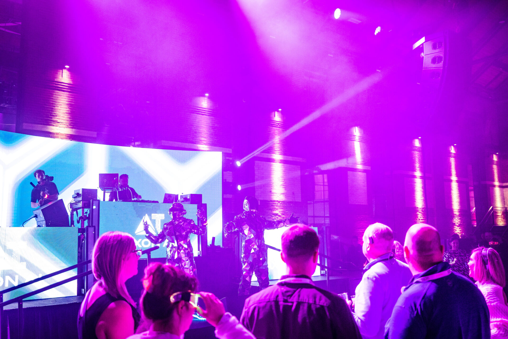 LED display showing brand content at AI product launch event produced by Black Diamond in Boston