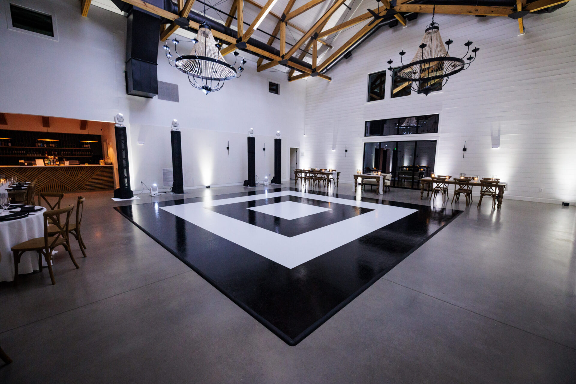 Custom black and white concentric ring dance floor at a luxury Boston gala event
