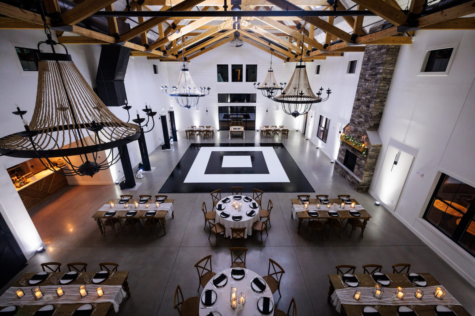 Black and white ring pattern dance floor rental at a Boston wedding reception
